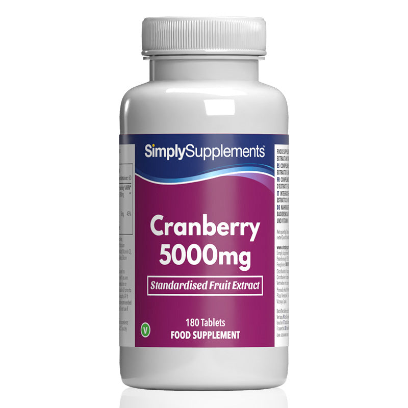 Flacon de compléments alimentaires portant l'étiquette « Canneberge 5000mg Simply Supplements », de couleur rose sur fond blanc.

