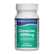 Flacon de compléments alimentaires portant l'étiquette «Cannelle 2000mg Simply Supplements », de couleur vert sur fond blanc.
