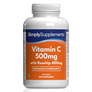 Flacon de compléments alimentaires portant l'étiquette « Vitamine C 500mg & Églantier 400mg Simply Supplements », de couleur orange sur fond blanc.
